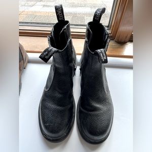 Women’s Doc Marten Boots in Black with easy-access zippers on both in/outside.